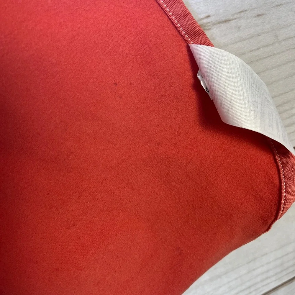 The Ollie‎ Swaddle Coral Pink Adjustable Infant Sleep Wrap